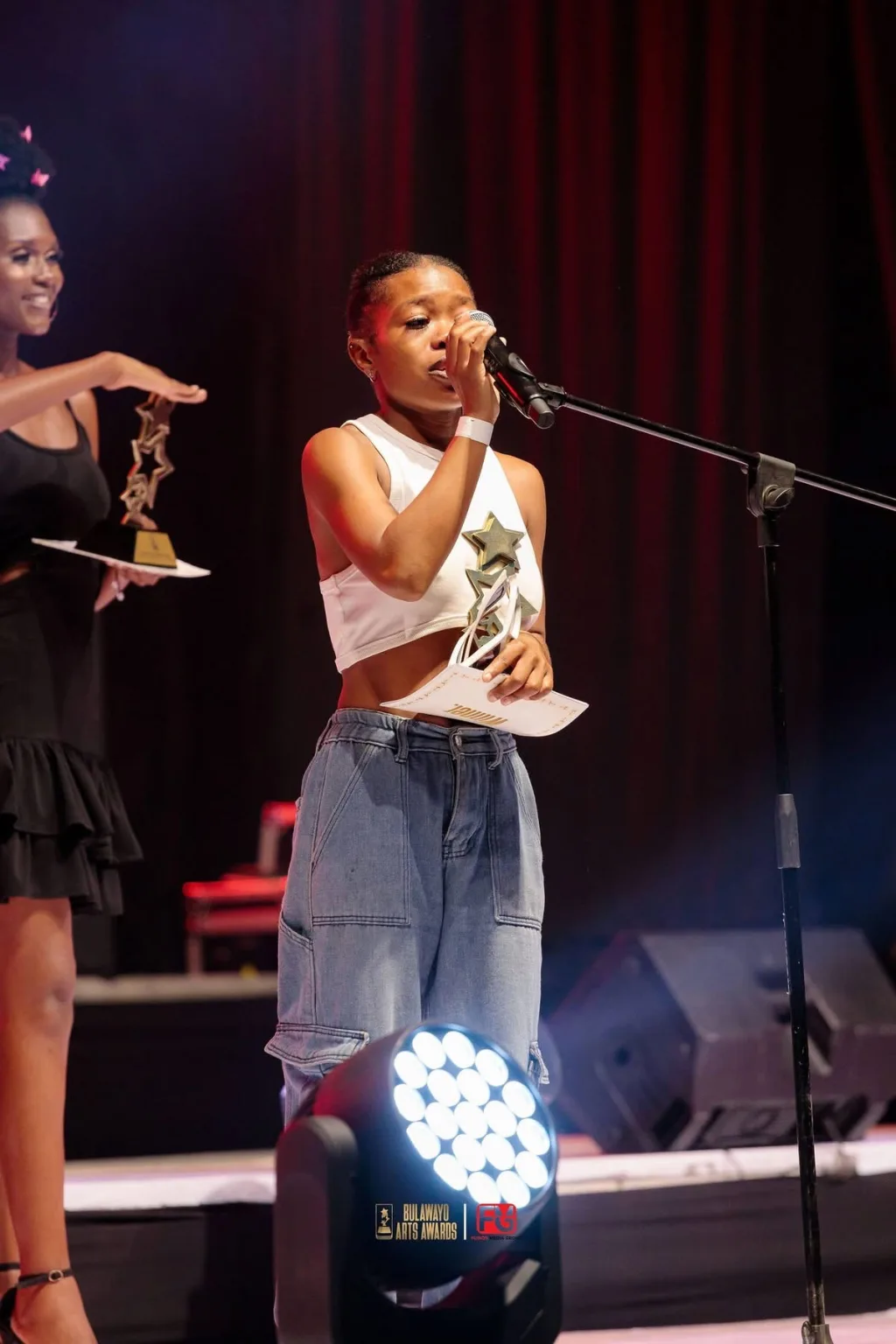 A content creator accepting an award